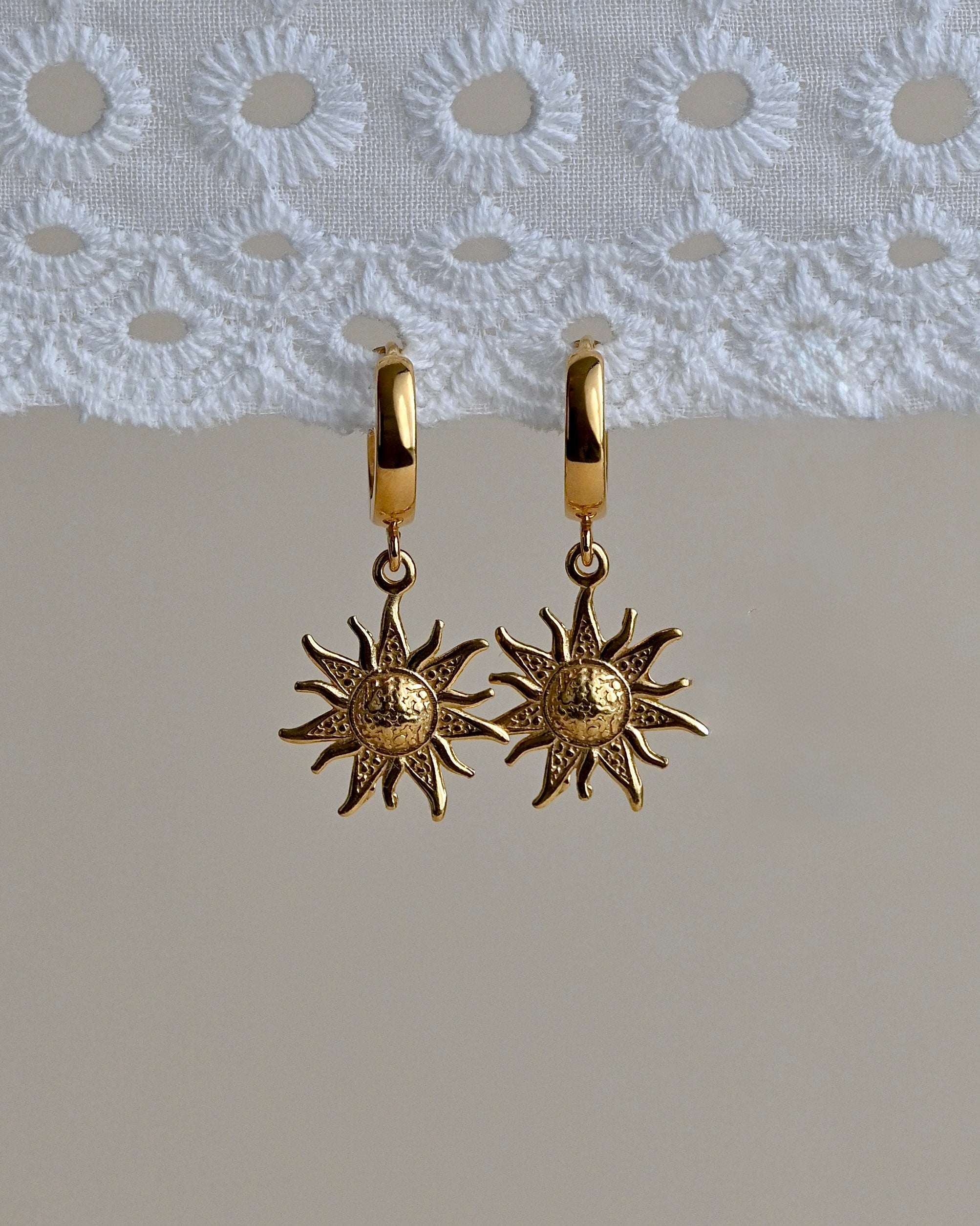 AINE sun earrings
