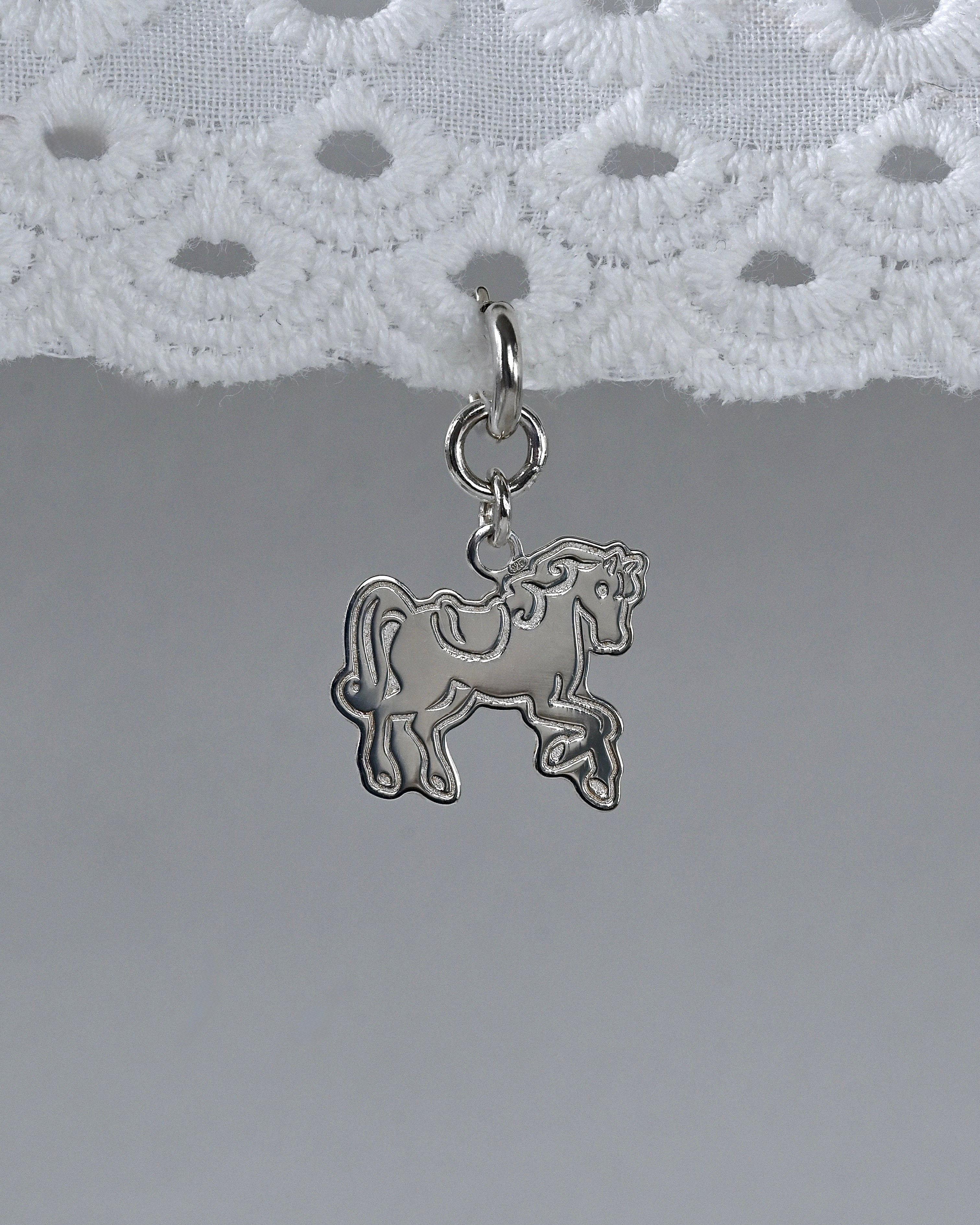 KONIK charms